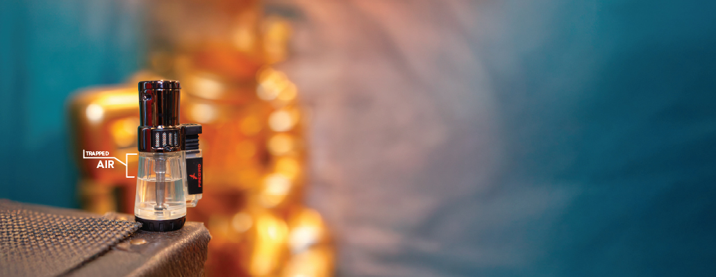 Step 2: Turn the torch cigar lighter upside down to help release trapped air before purging